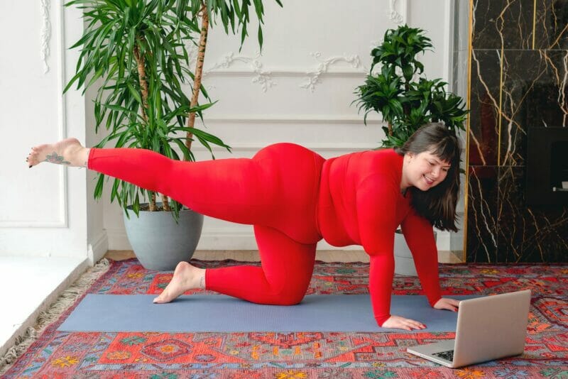 woman in red clothing exercising